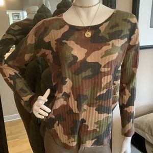 Nally and Millie top